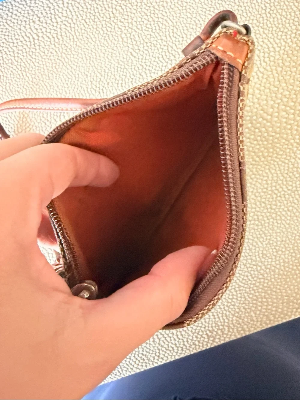 Coach Signature Canvas Wristlet Phone Case in Brown and Tan